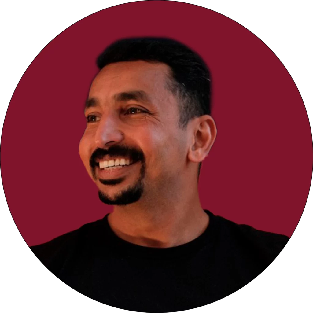 Jobin Kuruvilla photo centred on WATA Factory’s signature red corporate background.