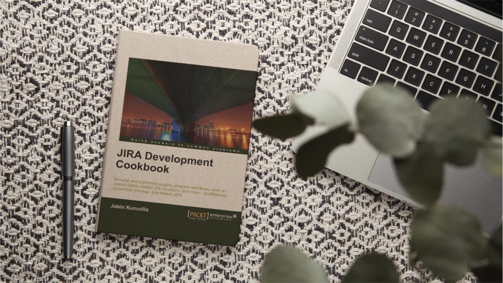 JIRA Development Cookbook cover near a laptop – practical developer book 2026 on mastering JIRA and agile workflows.