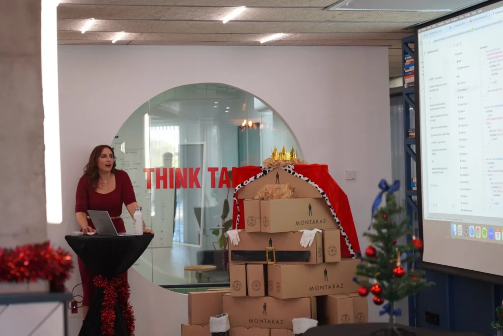 Raquel C., designer at WATA Factory, presenting a talk about Figma Make and AI-assisted design.