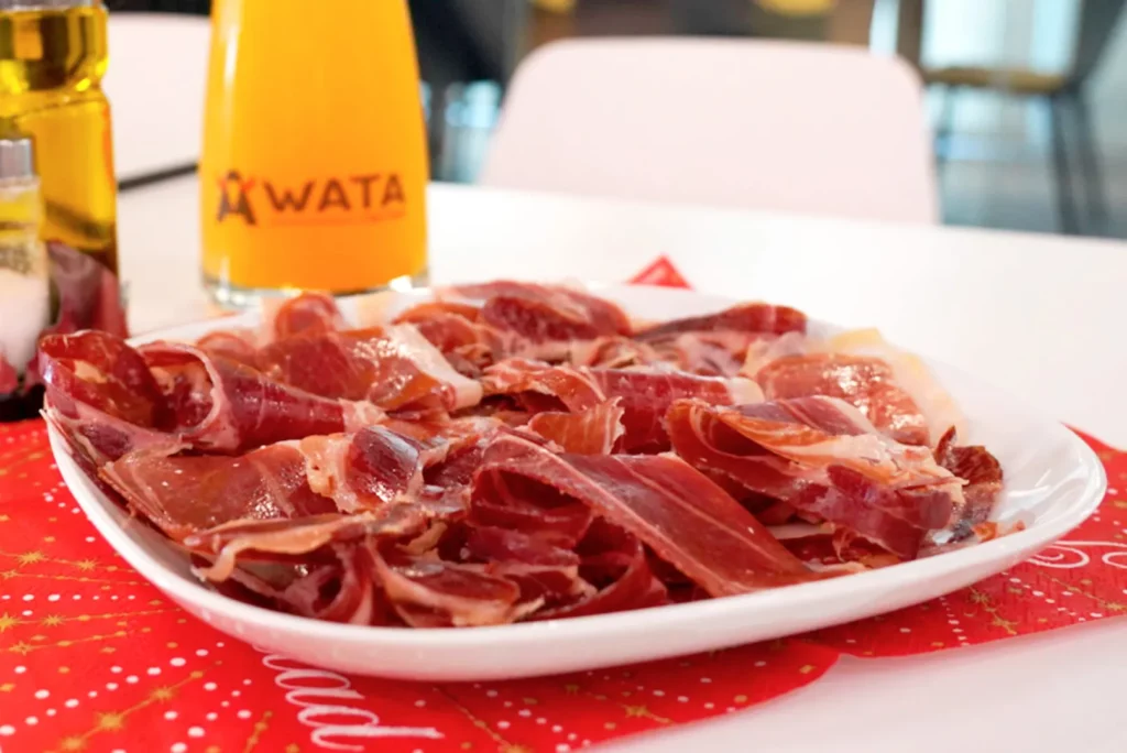 Ham from the Christmas gift basket served with orange juice at the office.