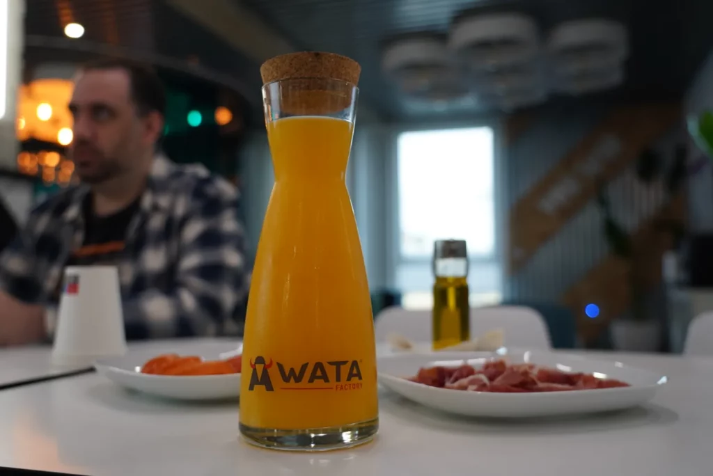 Andalusian breakfast at Iberica Labs with toast, tomato, olive oil, ham and orange juice at WATA Factory.