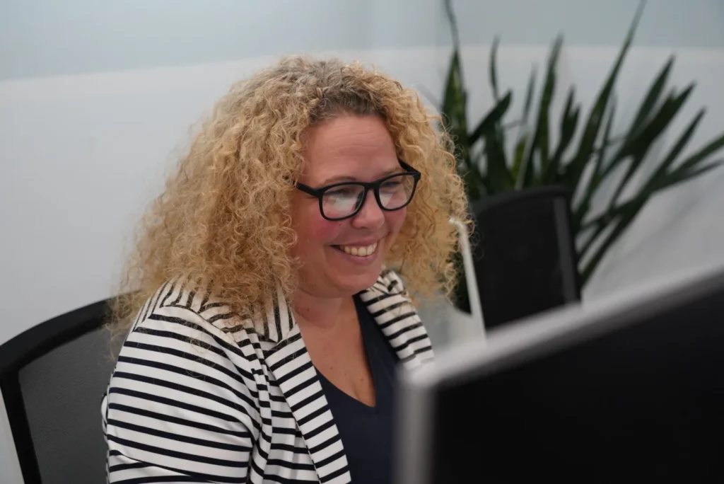 WATA Factory colleague reviewing results on her computer during the Iberica Labs technical session.