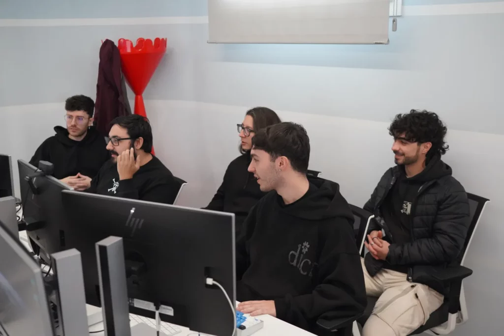 Development team analysing observability and monitoring tools during Iberica Labs.